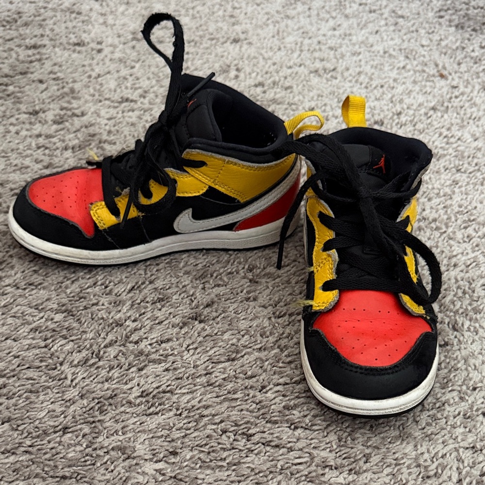 Nike Kids Air Jordan’s Black, Red, and Yellow Accents 9C